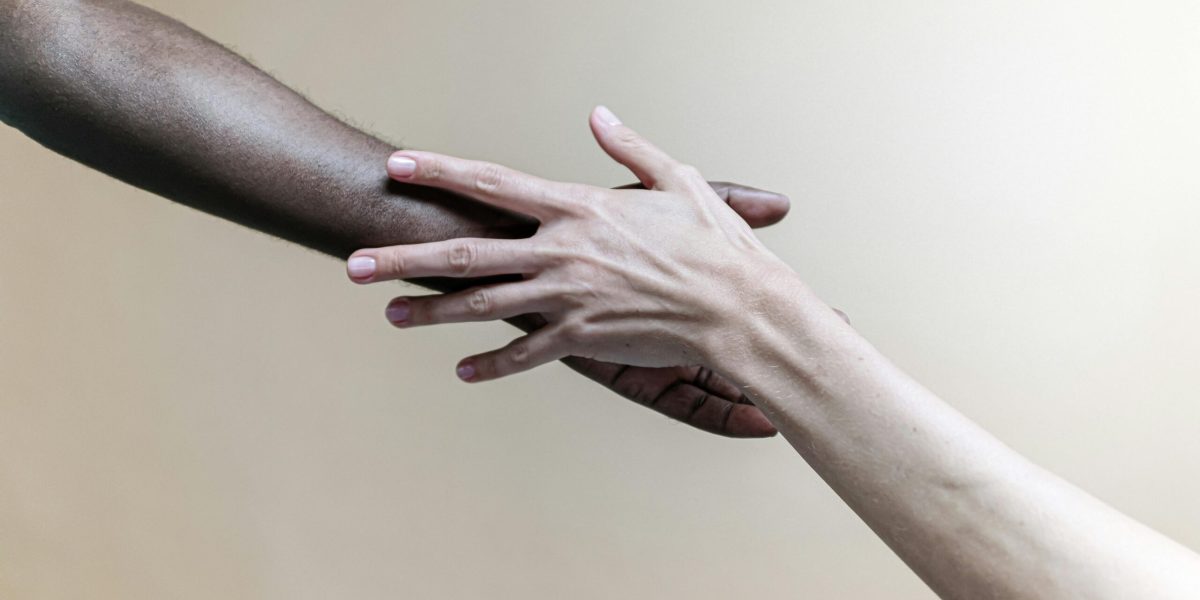 Photo Of People's Left Hands